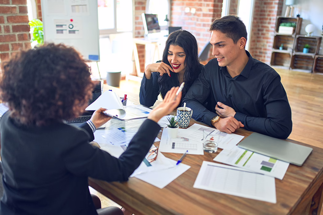 Couple working with financial advisor Ways to Give Planned Giving